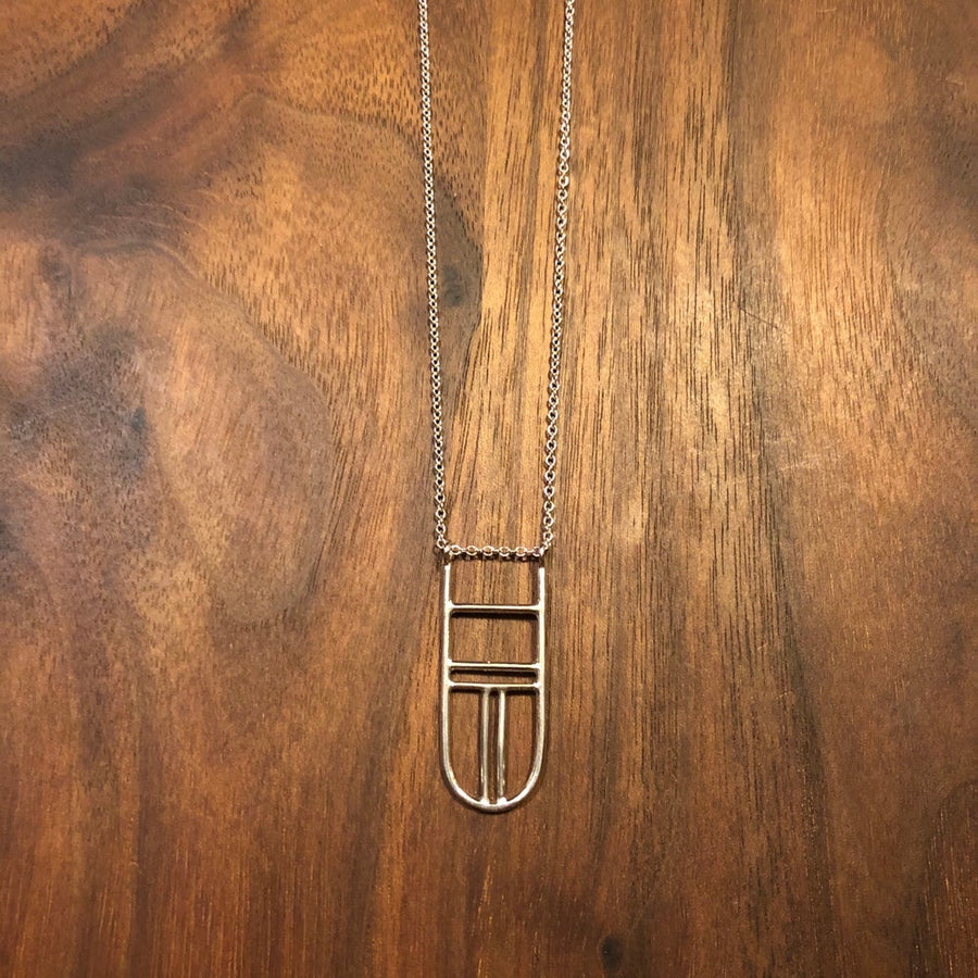 longer shield necklace
