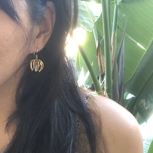 Caged petal earrings with drop stone